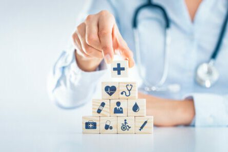 Health insurance - concept. Employee on Computer