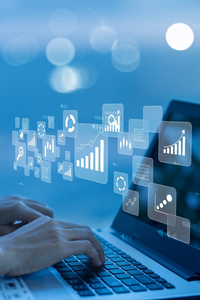 Businesswoman,Using,Laptop,In,Data,Management.with,Networking,,vertical V2 can help with ad sales and data cloud